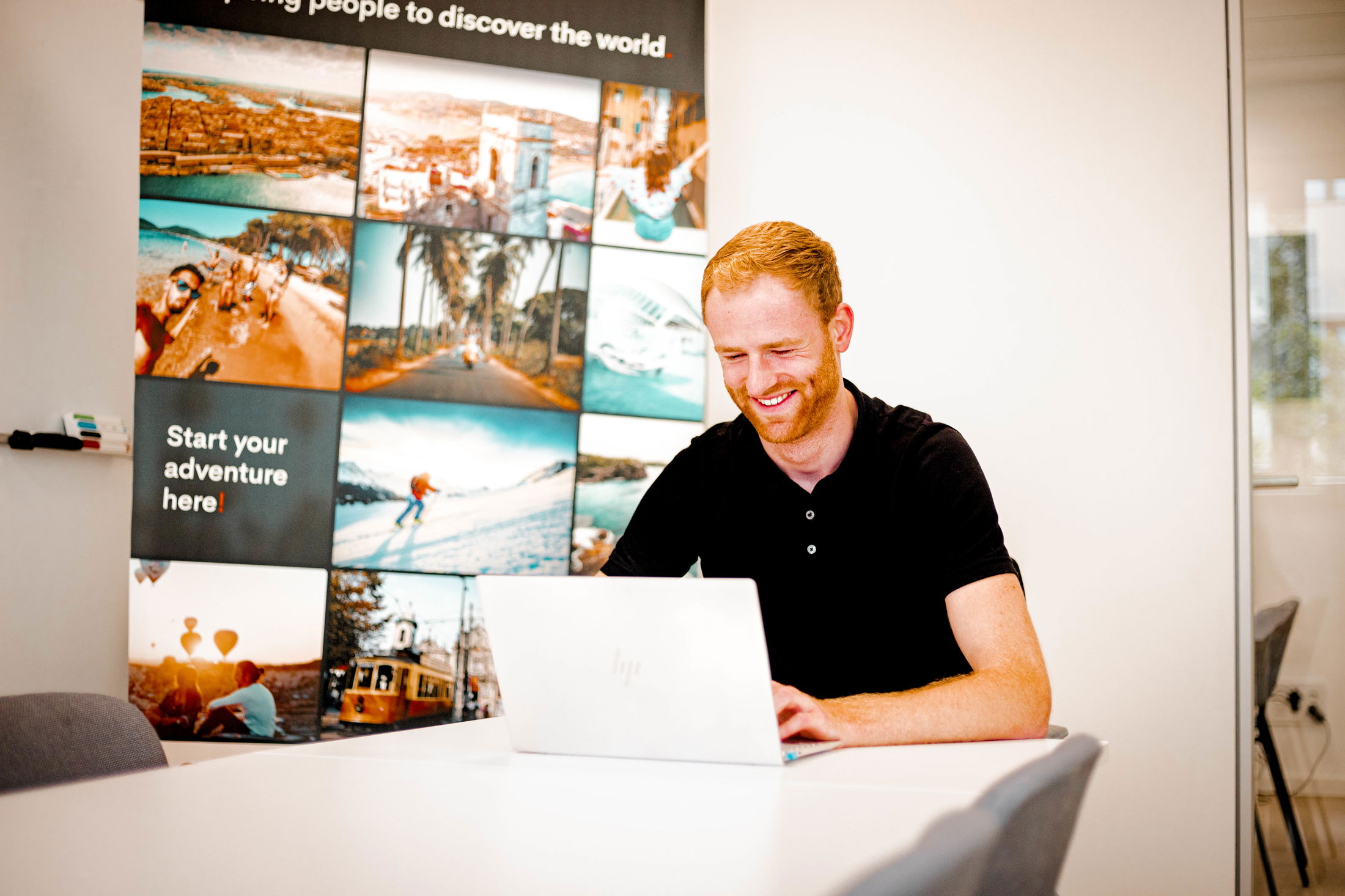 Man working in an office on a laptop